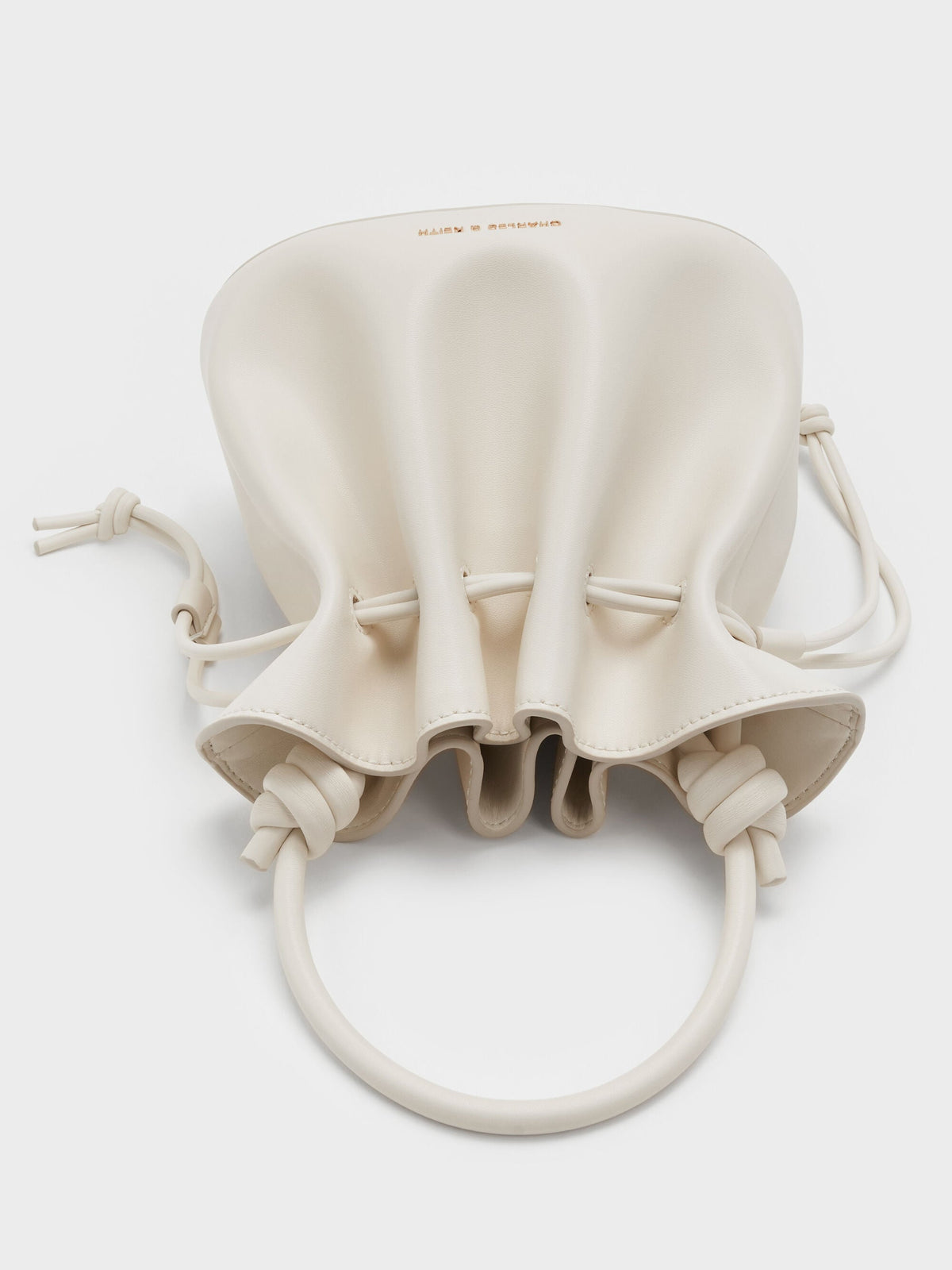 CHARLES & KEITH Customer Favorite / Sammie Drawstring Bucket Bag - Cream