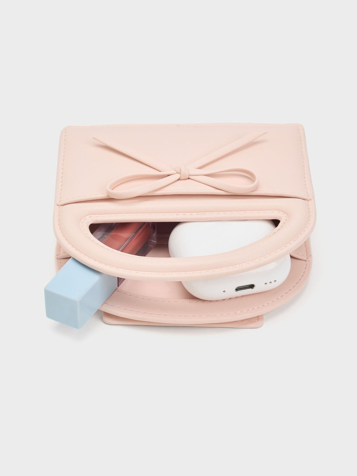 CHARLES & KEITH Customer Favorite / Reese Bow Top Handle Wristlet - Soft Pink