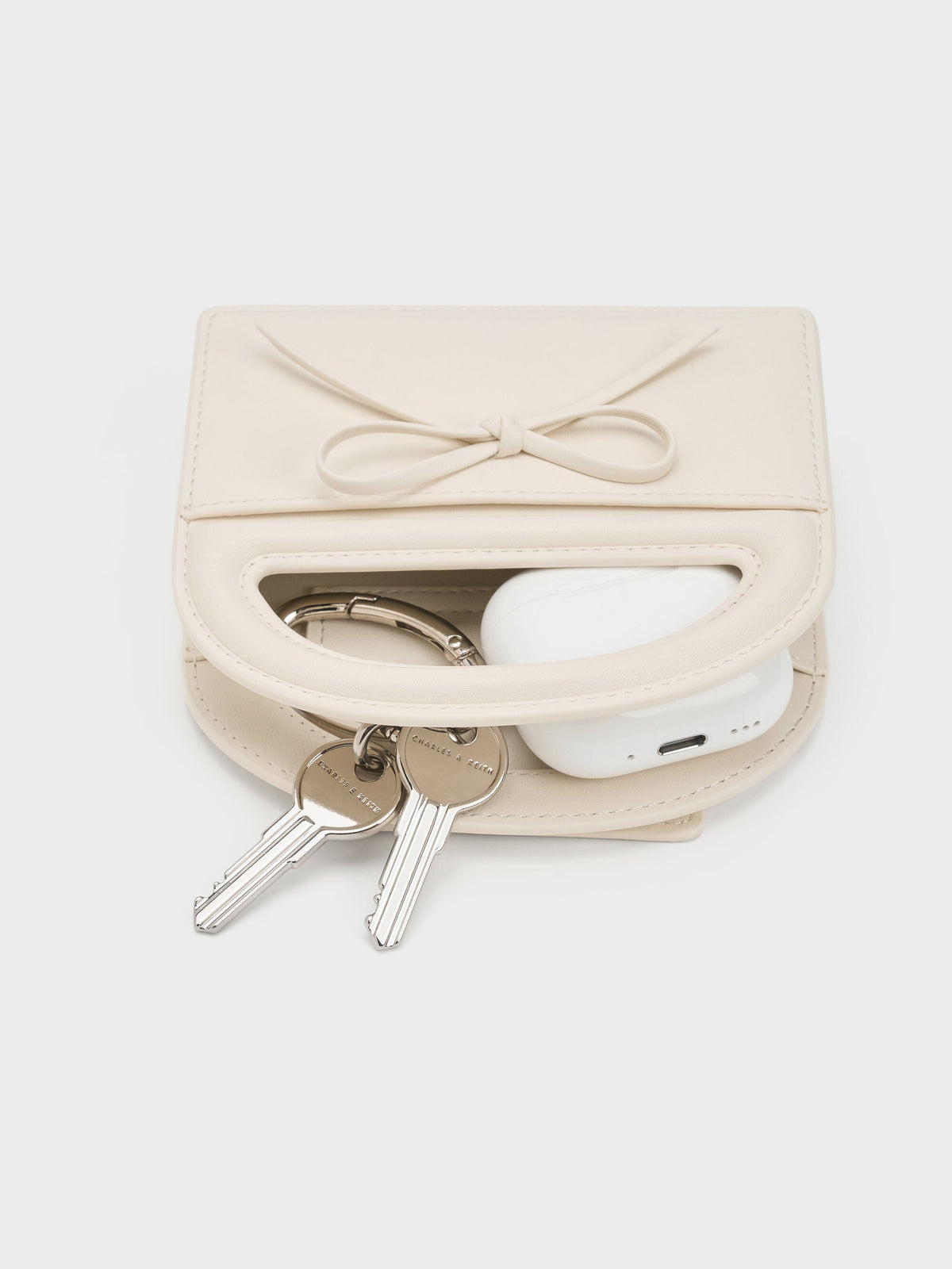 CHARLES & KEITH Featured / Reese Bow Top Handle Wristlet - Cream