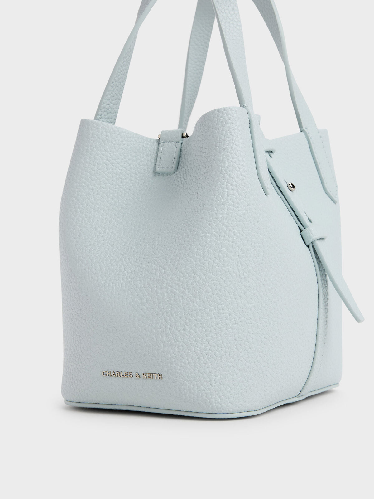 CHARLES & KEITH Top Pick / Beryl Belted Bucket Bag - Sea Salt Blue