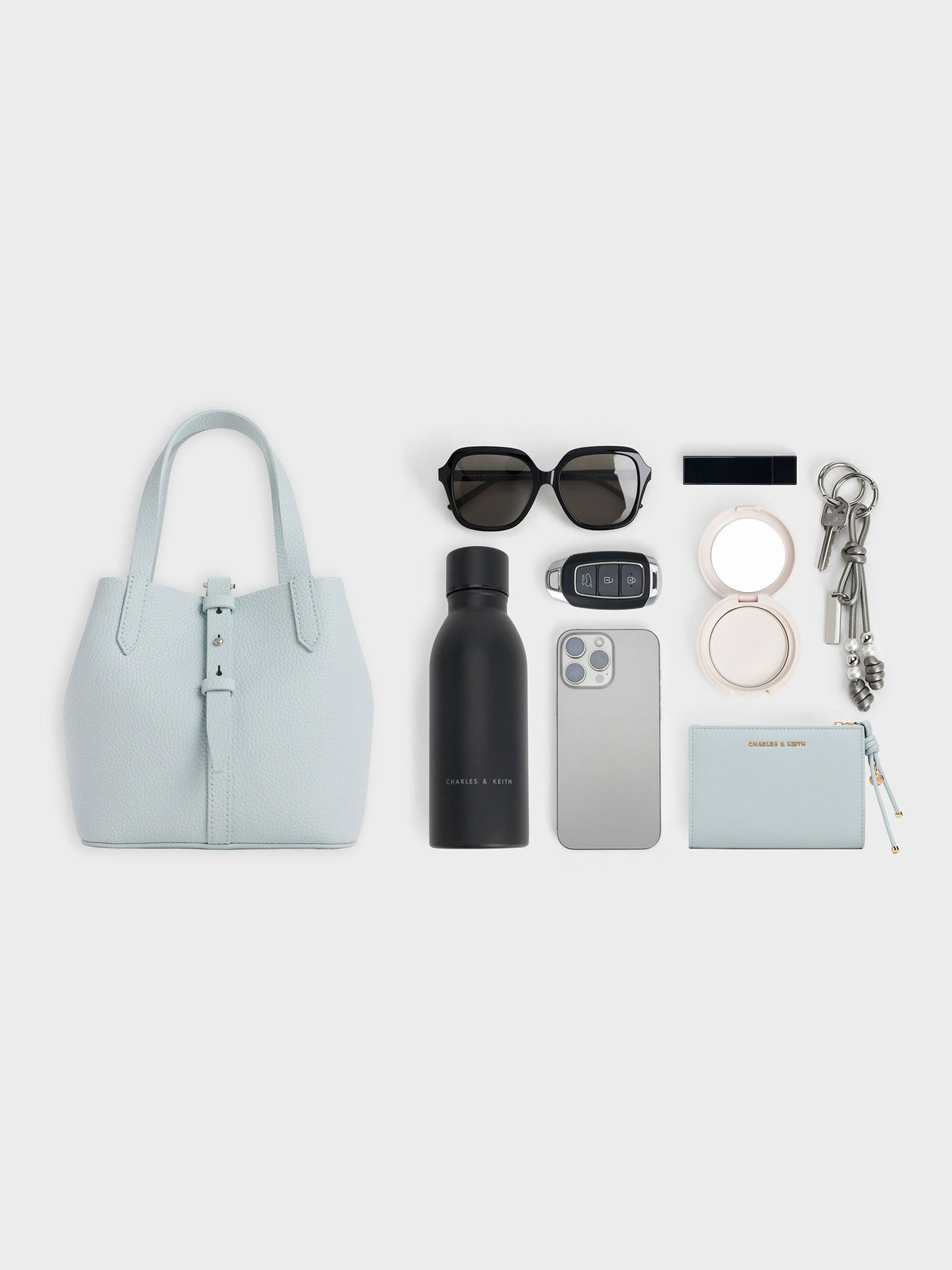 CHARLES & KEITH Top Pick / Beryl Belted Bucket Bag - Sea Salt Blue