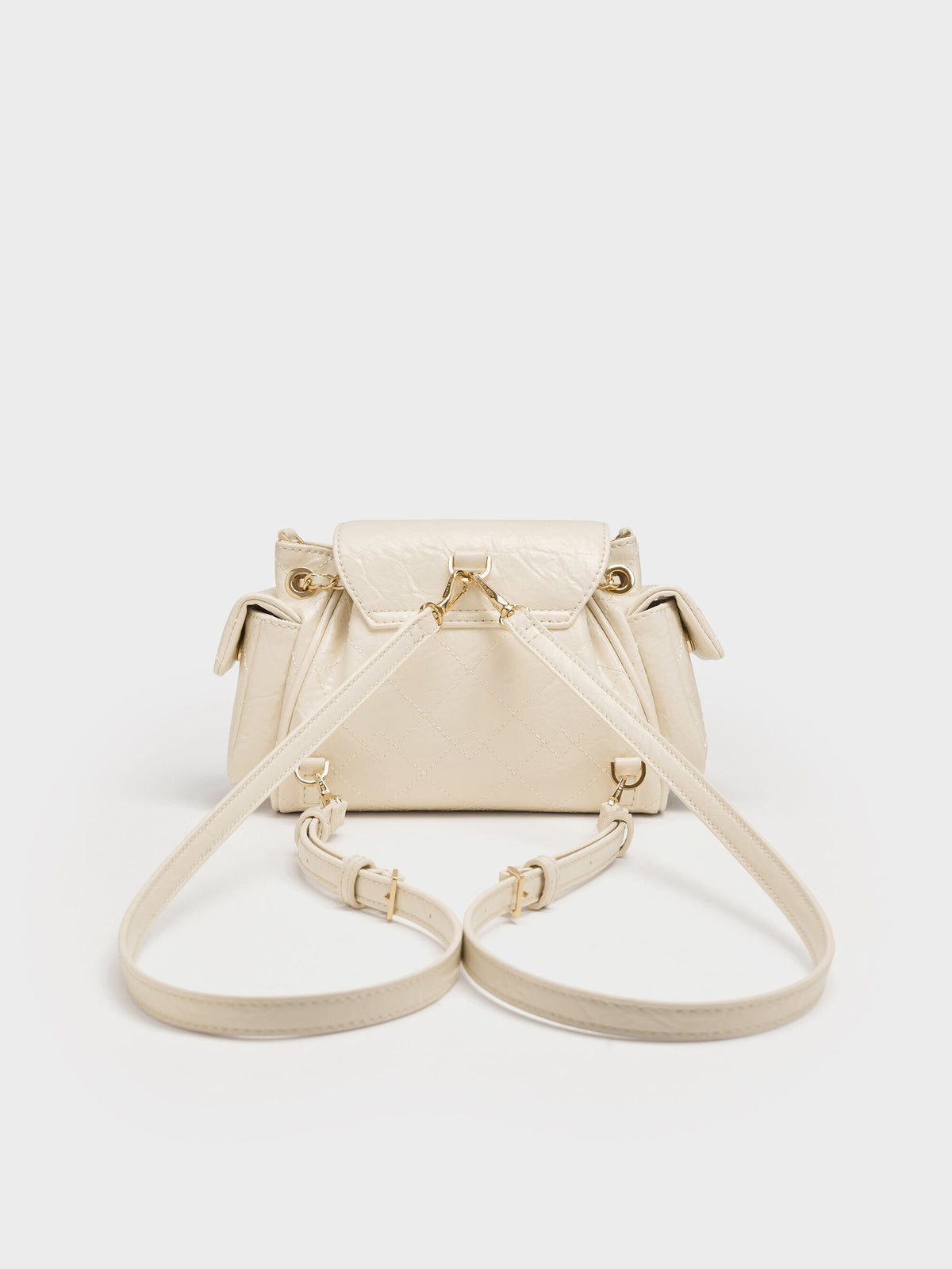CHARLES & KEITH Signature / Duo Quilted Two-Way Front Flap Backpack - Cream