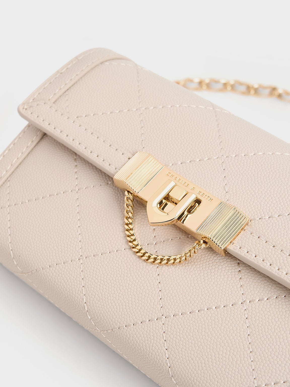 CHARLES & KEITH Recommended / Tallulah Quilted Push-Lock Clutch - Oat