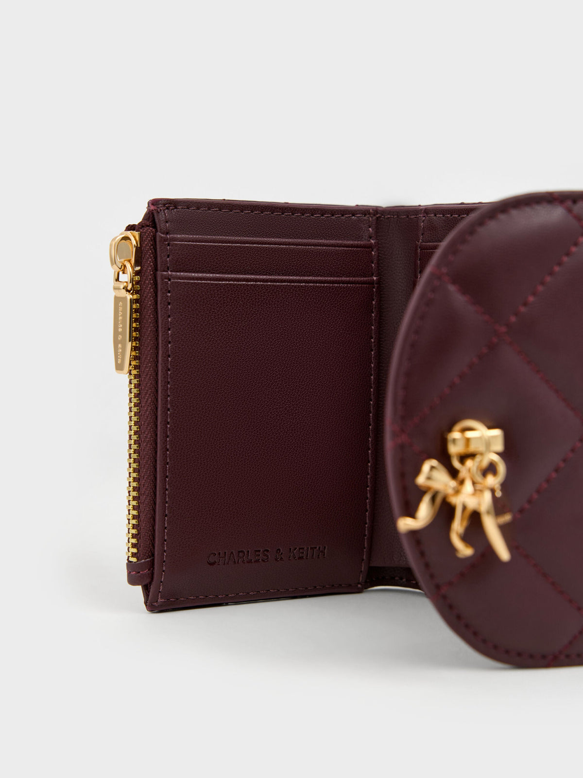 CHARLES & KEITH Trusted / Arrietty Quilted Curved-Flap Wallet - Wineberry Red