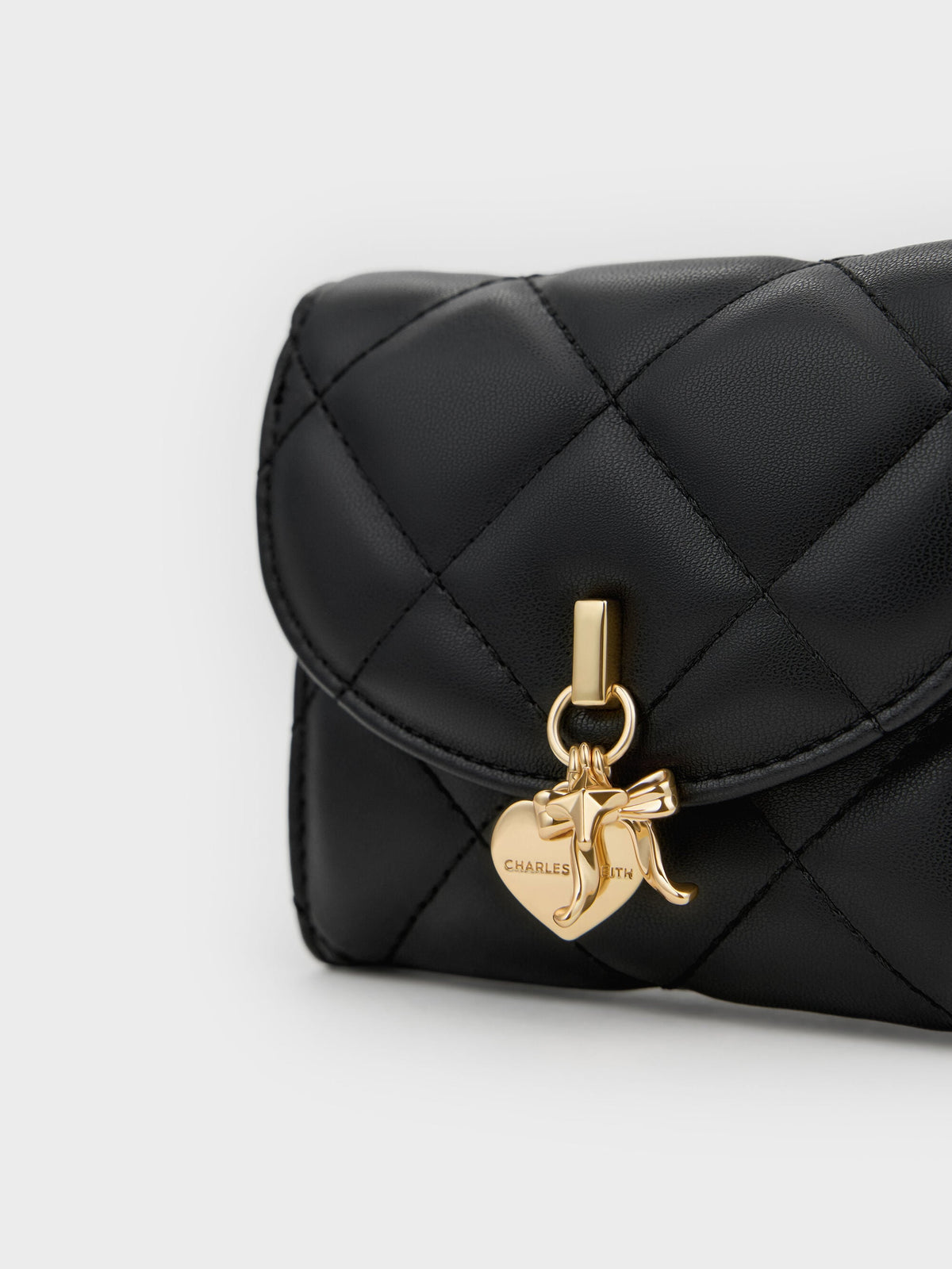 CHARLES & KEITH Recommended / Arrietty Quilted Curved-Flap Wallet - Black