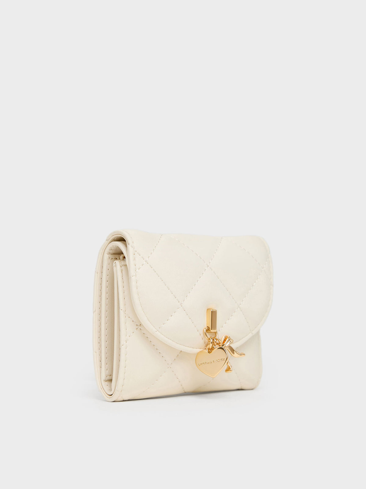 CHARLES & KEITH Premium / Arrietty Quilted Curved-Flap Wallet - Cream