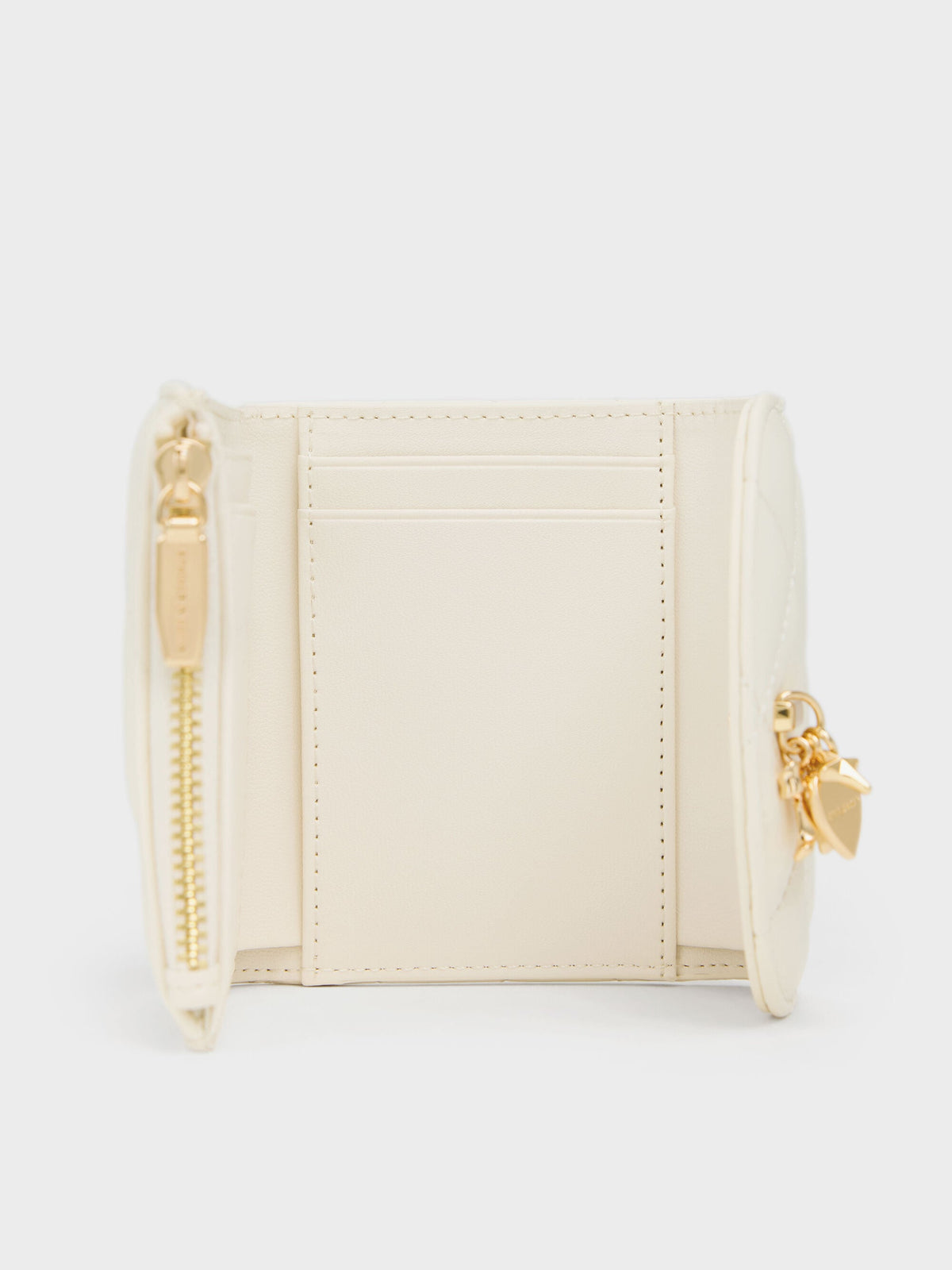 CHARLES & KEITH Premium / Arrietty Quilted Curved-Flap Wallet - Cream