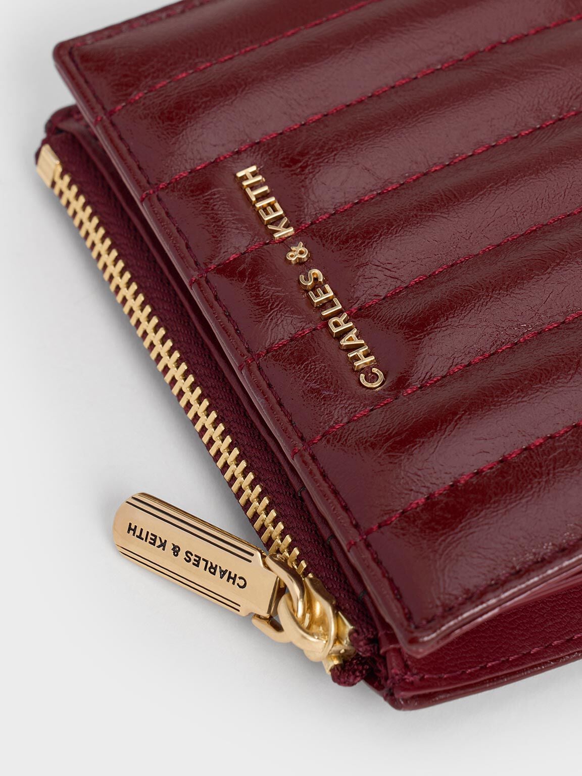 CHARLES & KEITH Trusted / Donna Panelled Top-Zip Wallet - Burgundy