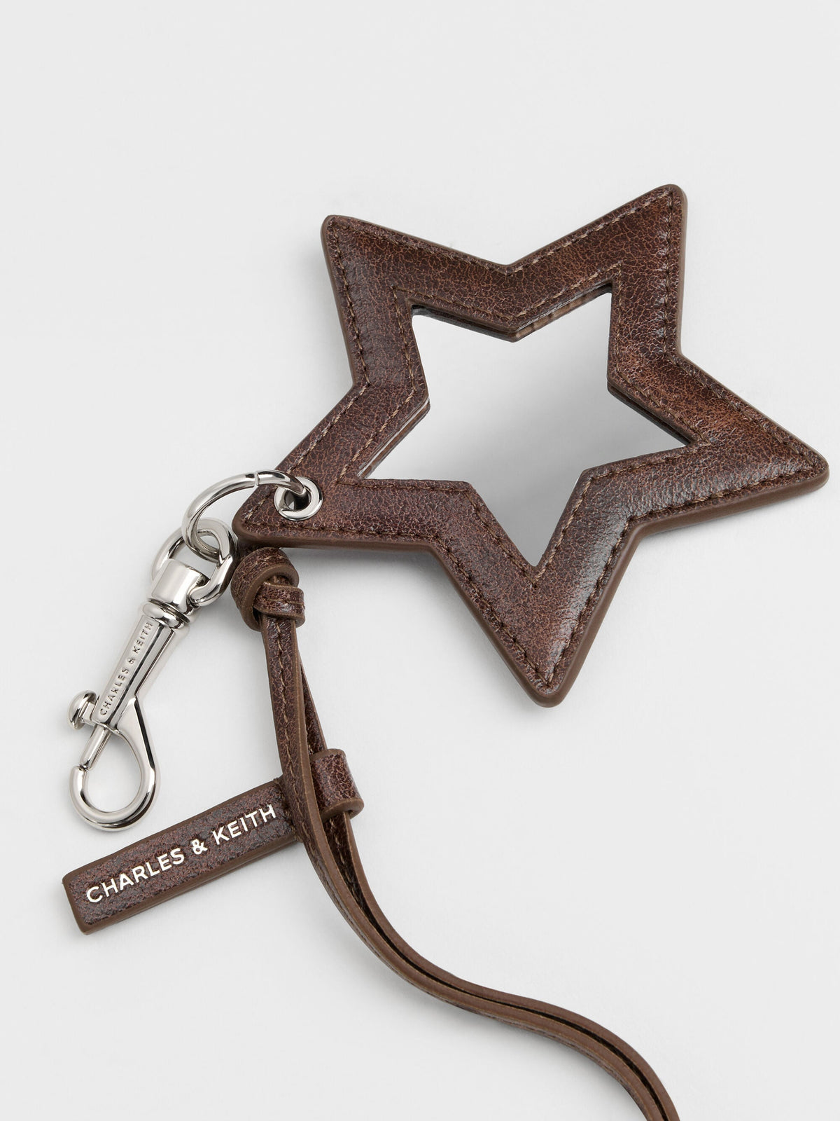 CHARLES & KEITH Quality / Noane Star Mirror Charm - Distressed Coffee