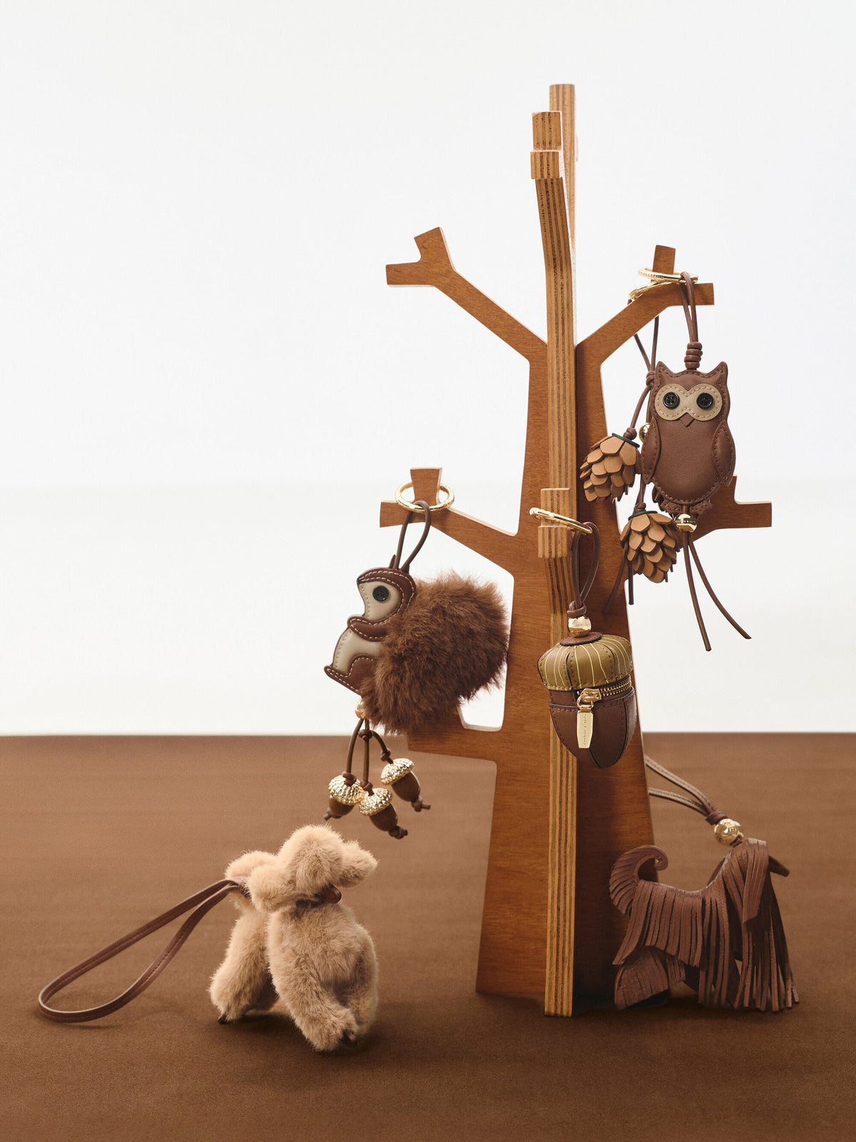 CHARLES & KEITH Hot Sale / Leather Fringed Dog Charm - Chocolate